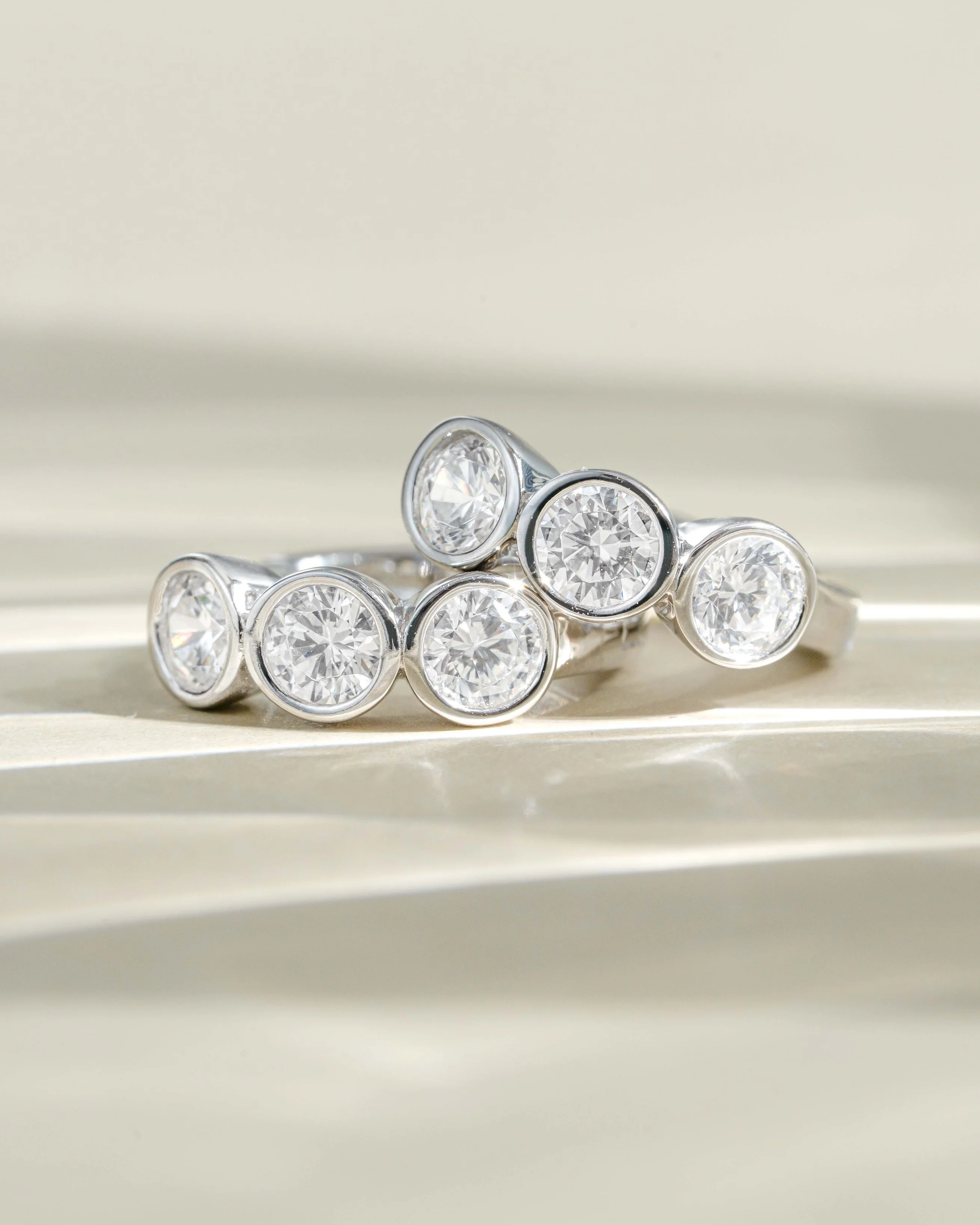 Bezel 3 Stone Huggie Hoop Earrings - Image 3